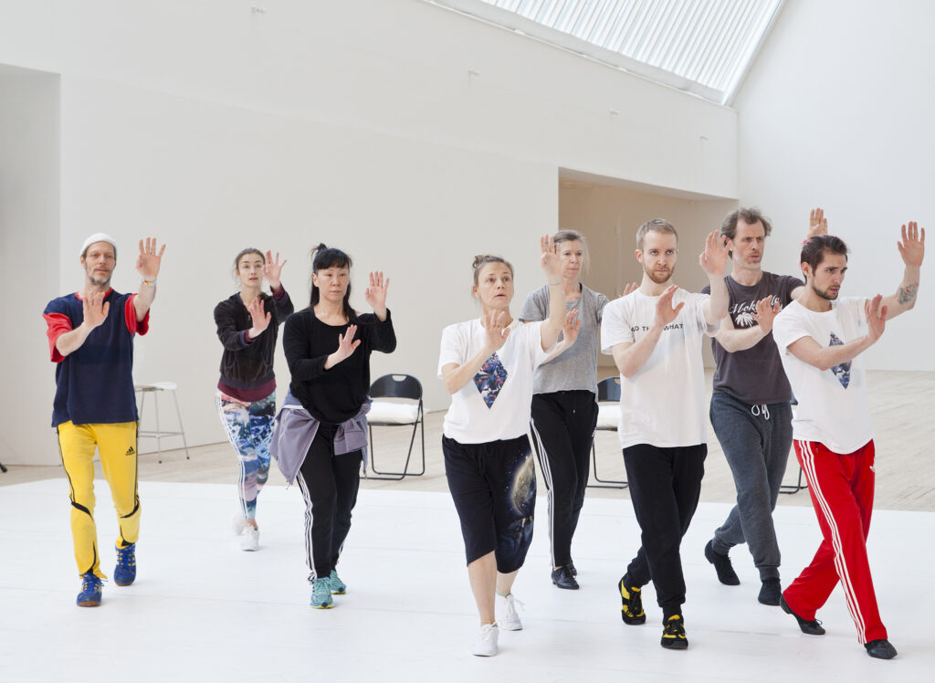 The dance group Weld with 8 dancers in Malmö Konsthall´s light shaft.