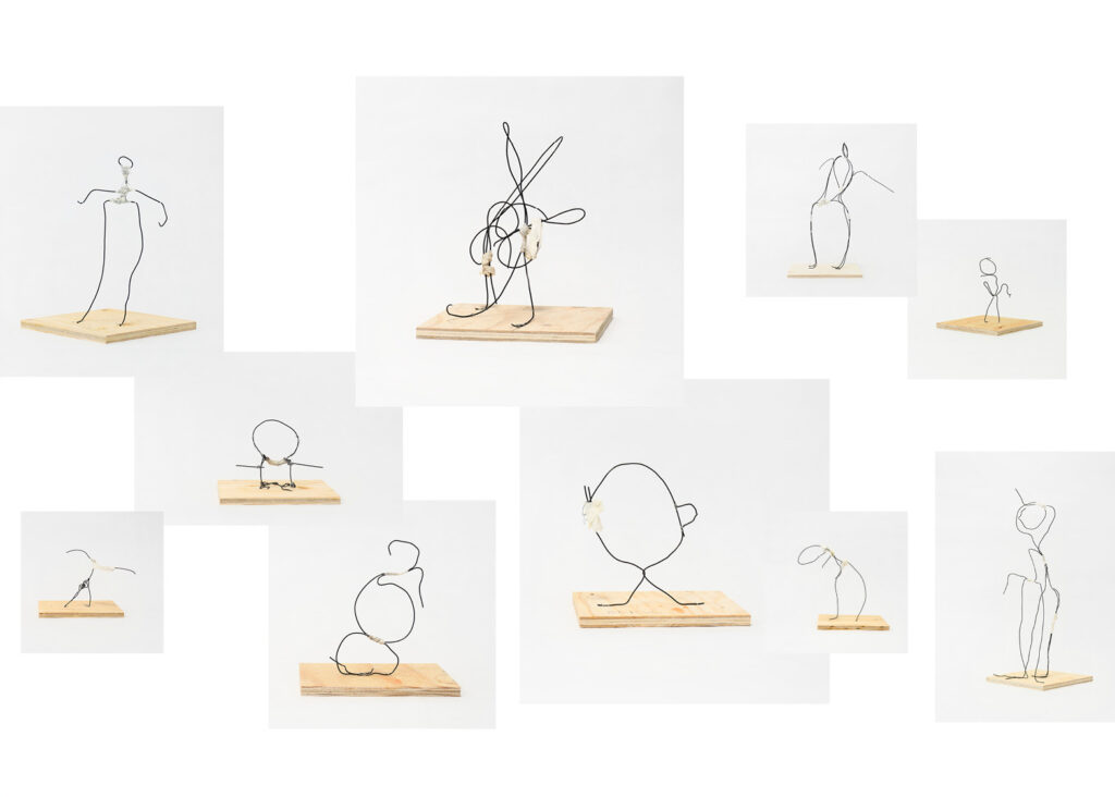 Grupp av människoliknande figurer skapade i ståltråd.