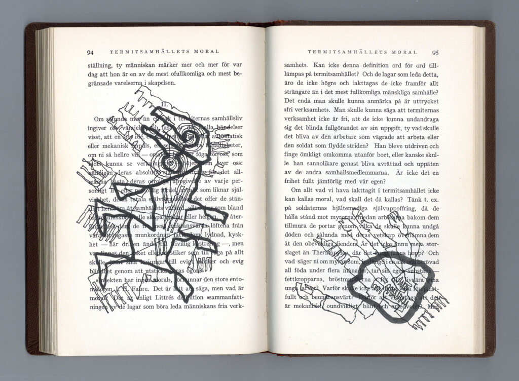  An open spread in a book with black illustrations over the text pages