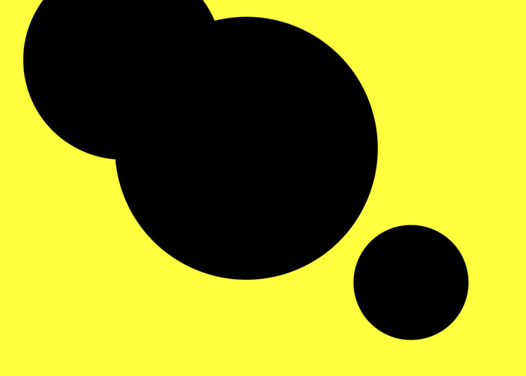 Lysande gul bild med svarta cirklar.